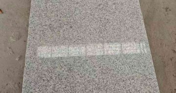 青海芝麻白光面毛板