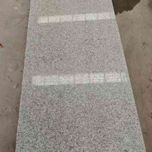 青海芝麻白光面毛板